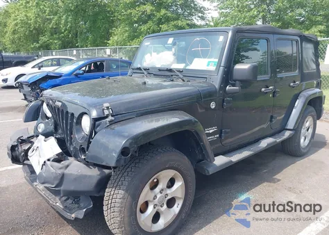2015 Jeep Wrangler Unlimited Sahara from USA, damaged, VIN 1C4HJWEG0FL525723